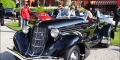 AUBURN 852SC, 1936 Carrosserie: Speedster, Auburn Cette extraordinaire carrosserie, malgré son arrière en "pointe de baeaut" ne parvint pas à sauver Auburn du naufrage financier. La Speedster est célèbre notamment pas son apparition au début du film Indiana Jones et le Temple Maudit, mais l’exemplaire présenté n’a pas un design identique. Participant: Andrew Pisker (UK)